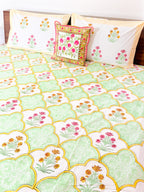 Gardenia handblock printed fitted bedsheet styled on a bed by ORA Living