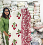 ORA Living Red Ivory Floral Handblock Reversible Pure Mulmul Cotton Quilt shown with both printed sides