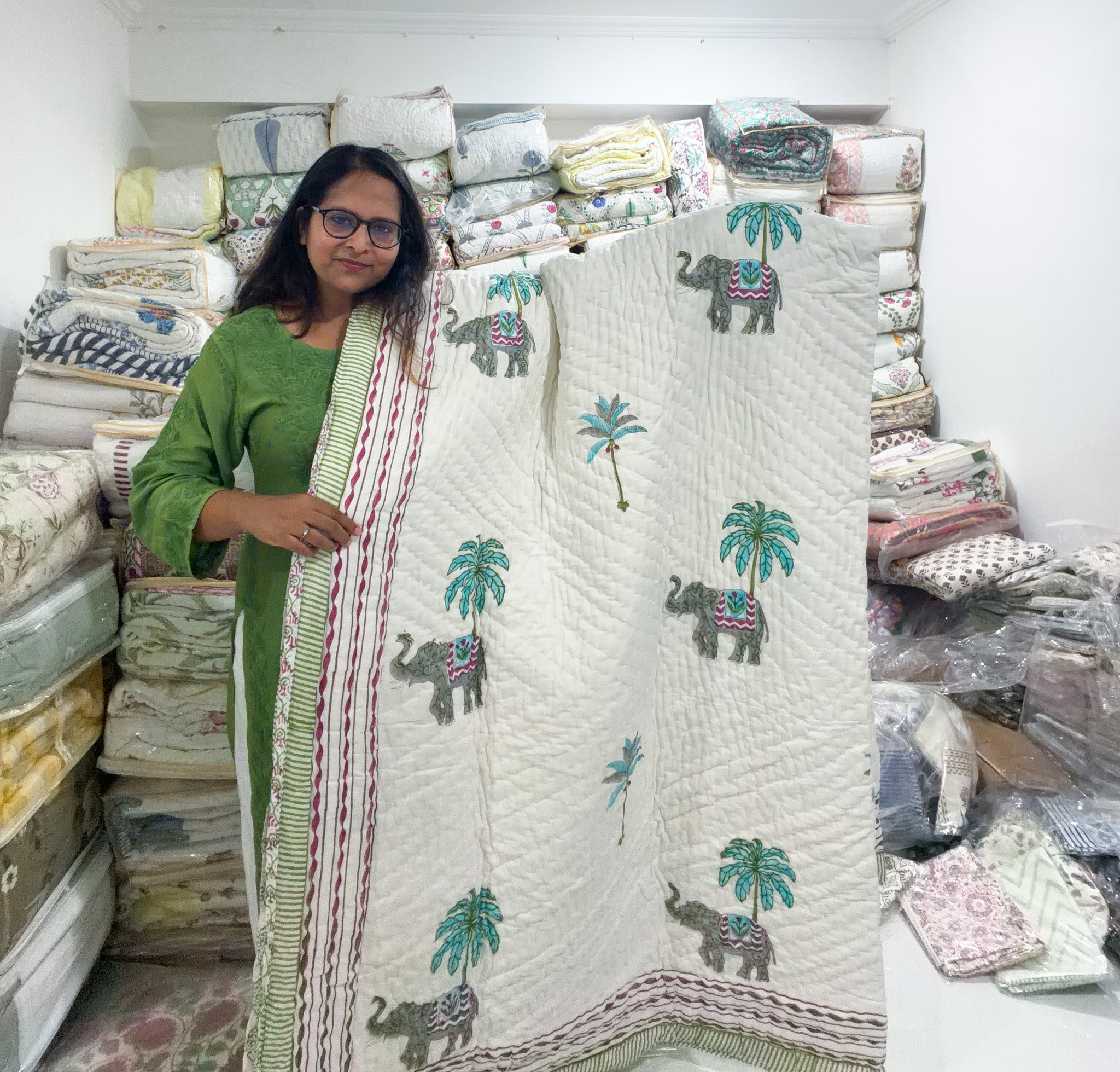 ORA Living Elephant Palm Handblock Reversible Pure Mulmul Cotton Quilt shown with both printed sides