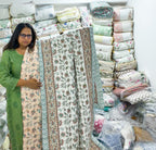 ORA Living Peach Floral Handblock Reversible Pure Mulmul Cotton Quilt shown with both printed sides