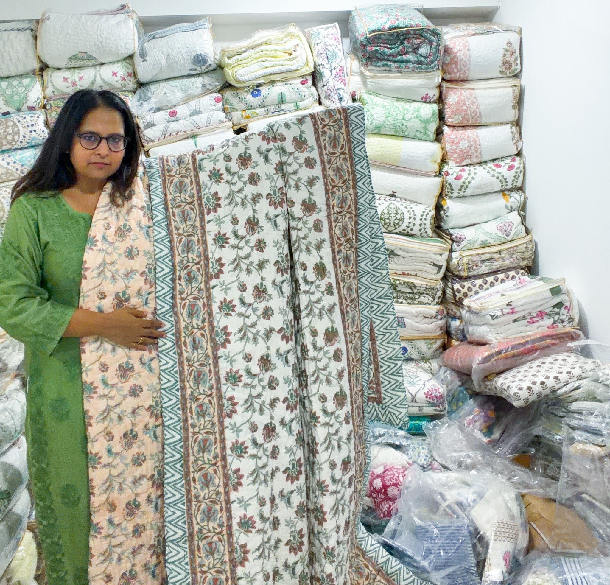 ORA Living Peach Floral Handblock Reversible Pure Mulmul Cotton Quilt shown with both printed sides
