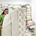 ORA Living Sage and Rust Floral Handblock Reversible Pure Mulmul Cotton Quilt shown with both printed sides