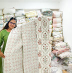 ORA Living Sage and Rust Floral Handblock Reversible Pure Mulmul Cotton Quilt shown with both printed sides