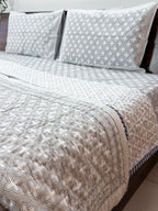 Grey and white cross print detail of ORA Living Grey Cross Handblock Reversible Pure Mulmul Cotton Quilt