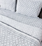Reversible grey cross pattern detail of ORA Living Grey Cross Handblock Reversible Pure Mulmul Cotton Quilt