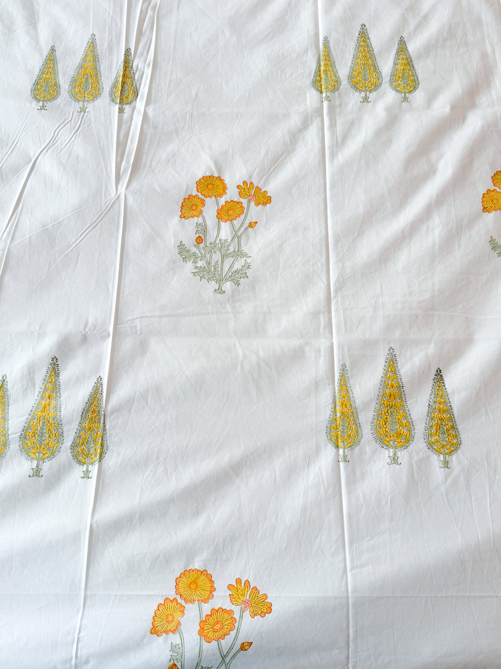 Full view of the hand block print on ORA Living Yellow Flower Blue Stripe Handblock Premium Cotton Bedsheet Set