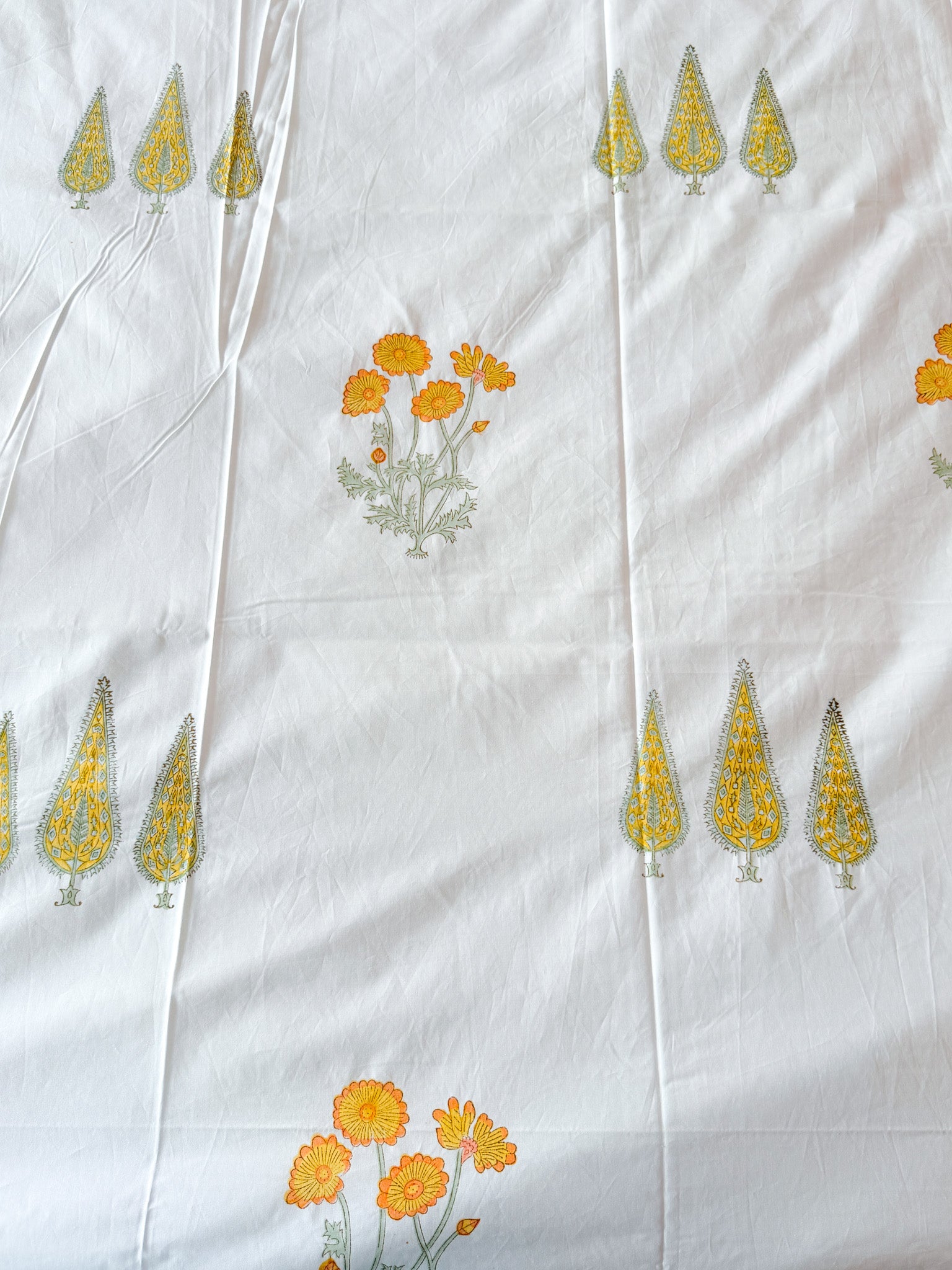 Full view of the hand block print on ORA Living Yellow Flower Blue Stripe Handblock Premium Cotton Bedsheet Set
