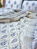 ORA Living Blue Grey Floral Handblock Reversible Pure Mulmul Cotton Quilt shown with both printed sides