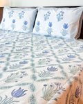 ORA Living Blue Flower Sage Leaf Handblock Premium Cotton Bedsheet Set styled on a bed