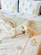 ORA Living Primrose Green Leaf Handblock Reversible Pure Mulmul Cotton Quilt shown with both printed sides