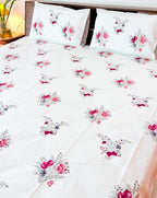 ORA Living Pink Anar Garden Handblock Premium Cotton Bedsheet Set styled on a bed