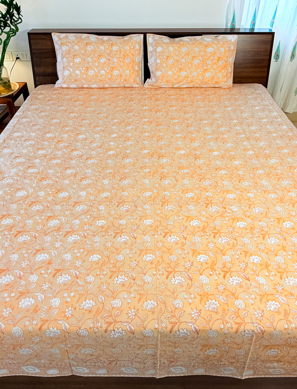 Full view of the hand block print on ORA Living Orange White Floral Handblock Premium Cotton Bedsheet Set