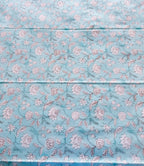 ORA Living Sky Blue White Floral Handblock Premium Cotton Bedsheet Set styled on a bed