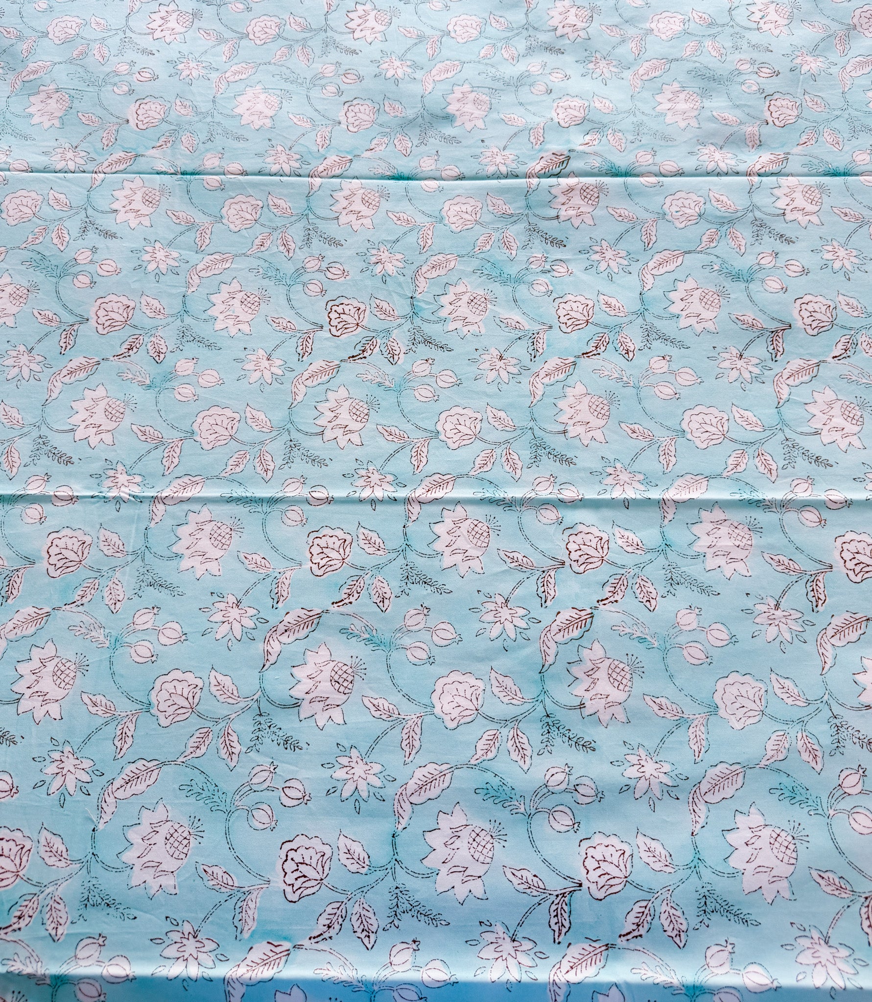 ORA Living Sky Blue White Floral Handblock Premium Cotton Bedsheet Set styled on a bed